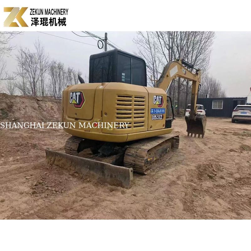 CAT 305.5E2 Escavatore a trascinatore di 5,5 tonnellate con pollice idraulico di Caterpillar