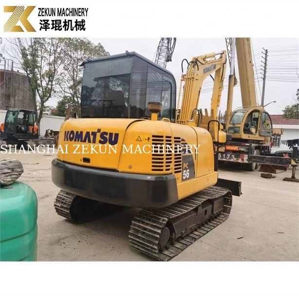 Miniescavatore Komatsu PC56-7 con peso operativo di 5 tonnellate e motore diesel resistente