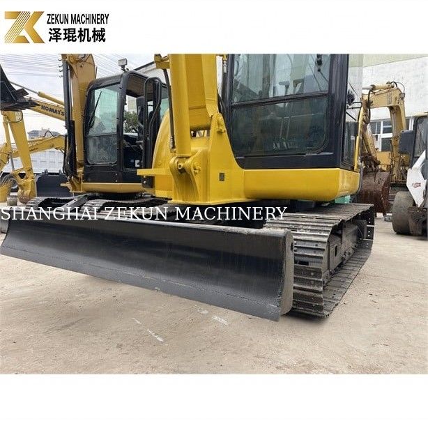 Miniescavatore Komatsu PC56-7 con peso operativo di 5 tonnellate e motore diesel resistente
