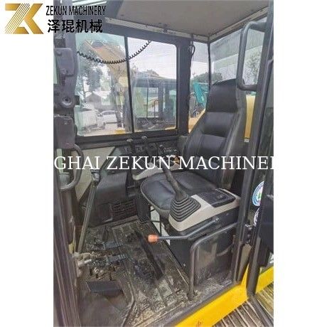 Miniescavatore Komatsu PC56-7 con peso operativo di 5 tonnellate e motore diesel resistente