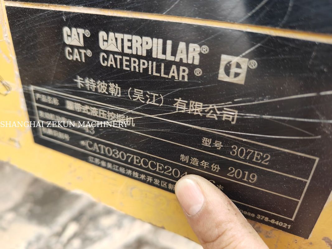Escavatore CAT 307E2 del 2019 con sbraccio massimo a livello del suolo di 400 mm e capacità del serbatoio carburante di 135 L